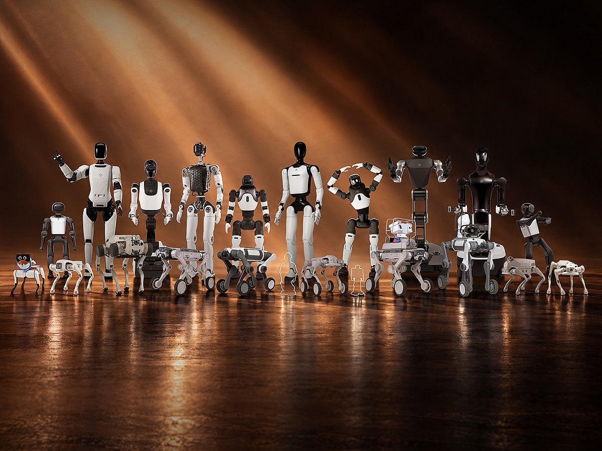 A studio lineup of humanoid and four-legged robots under warm light.