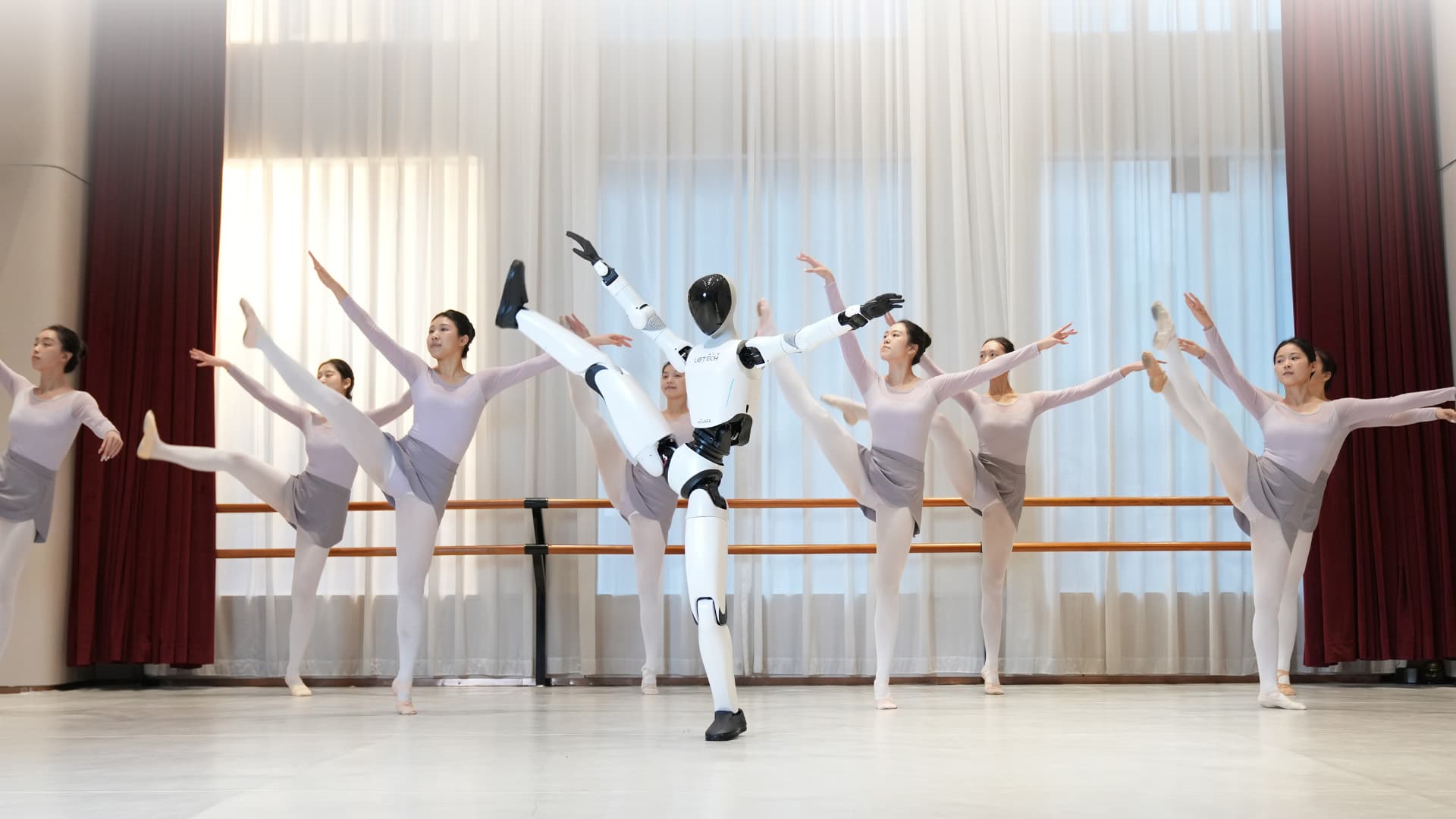A UBTECH Walker humanoid in a company photograph.